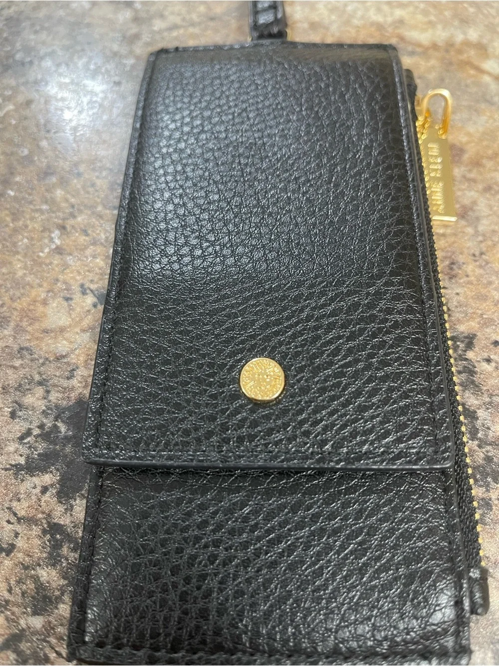 Anne Klein black pebble leather zip wristlet with gold hardware